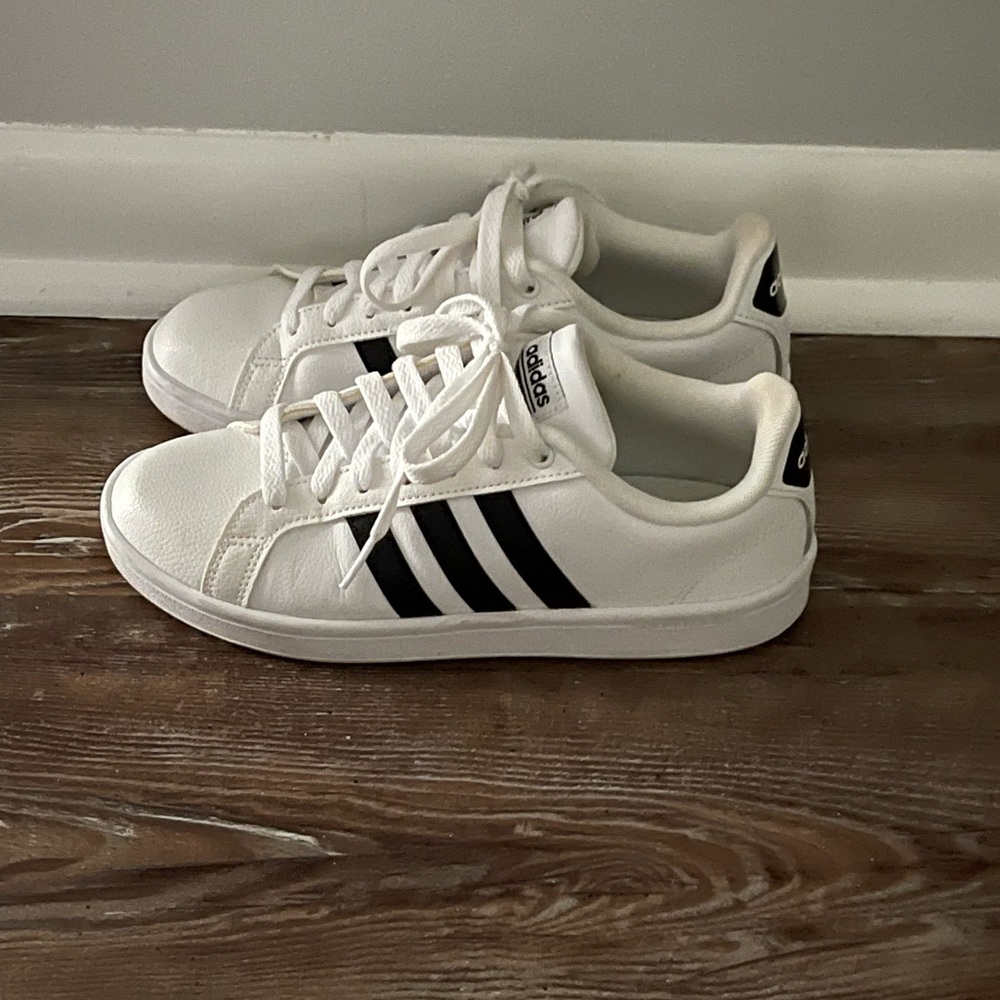 Adidas tennis shoes.